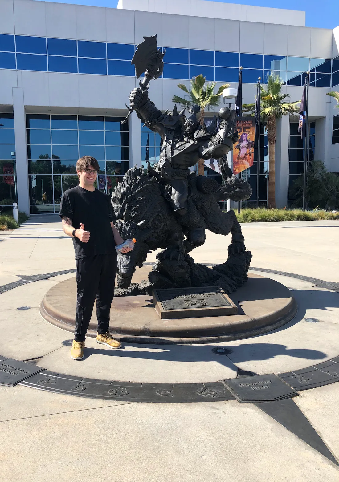 Person in front of Orc statue at Blizzard Entertainment