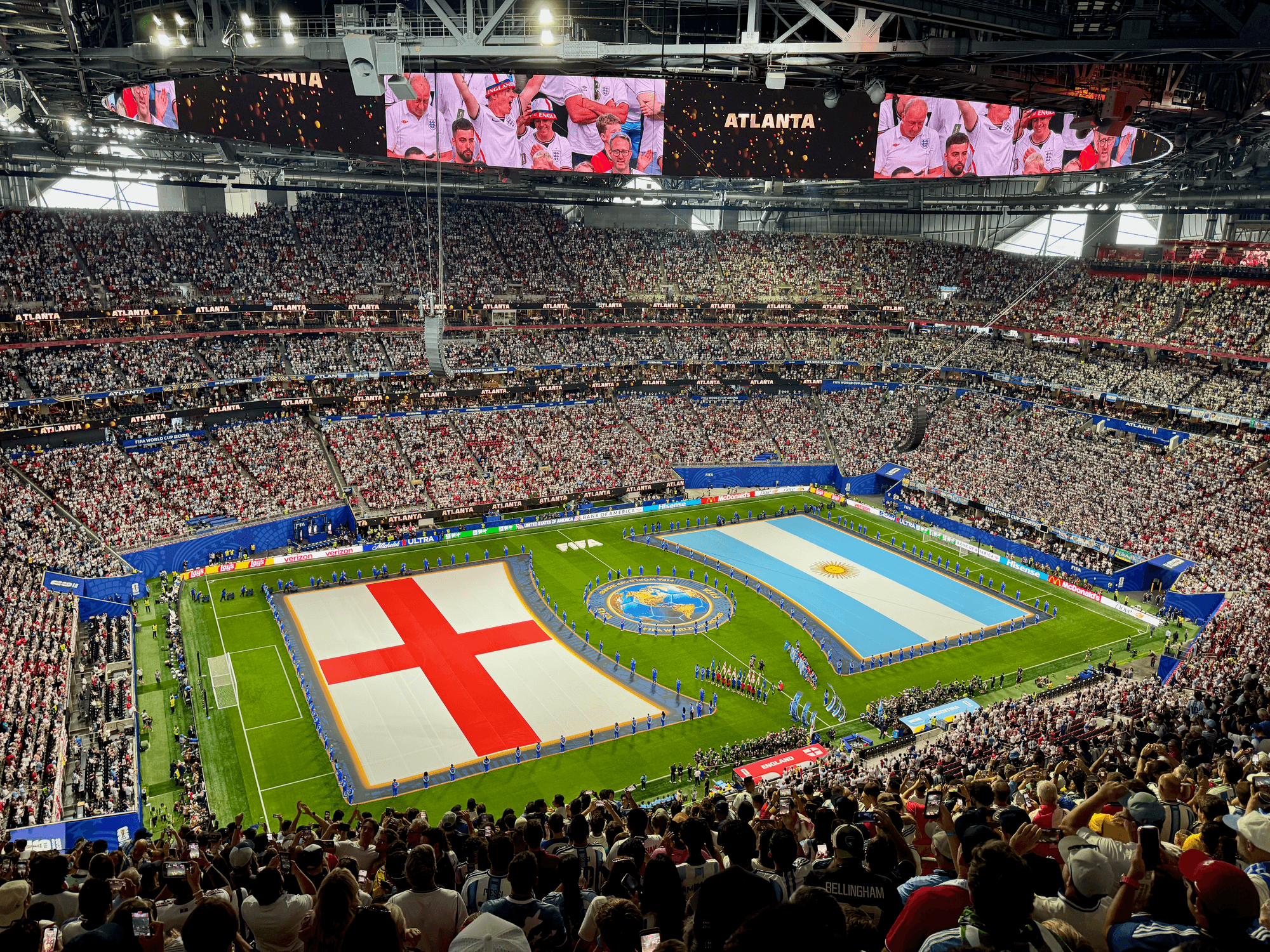 A wide shot showing the packed Mercedes-Benz Stadium pitch before the match